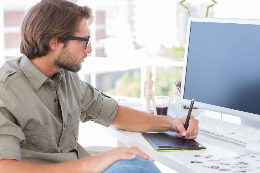 man learning on laptop